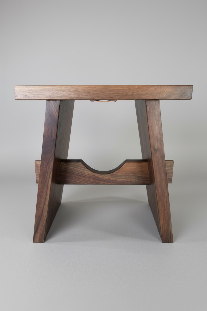 A beautiful walnut bench handcrafted by Scott Blackett, a Metro Detroit woodworker who started making saw dust thirty-five years ago. 