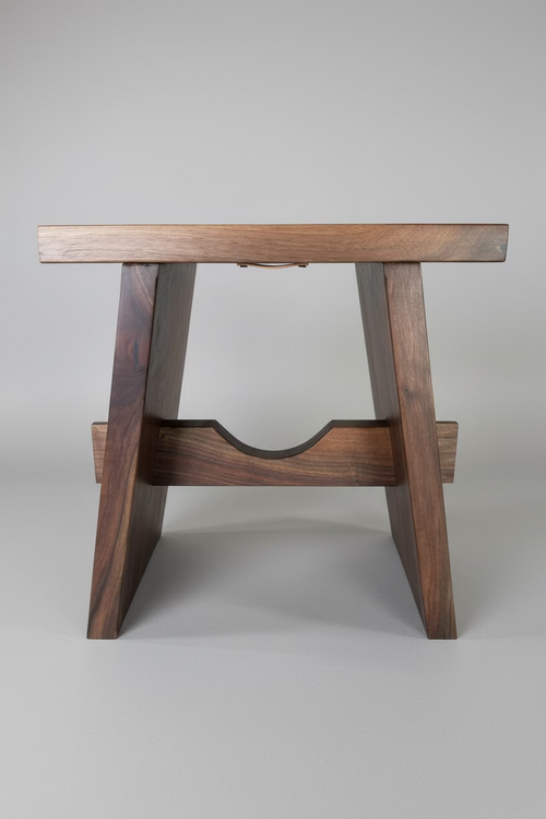 A beautiful walnut bench handcrafted by Scott Blackett, a Metro Detroit woodworker who started making saw dust thirty-five years ago. 