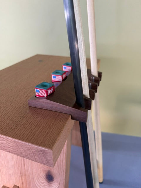 Walnut Pool Cue Holder with five different pockets, with three pockets to place your chalk, made in the United States. 